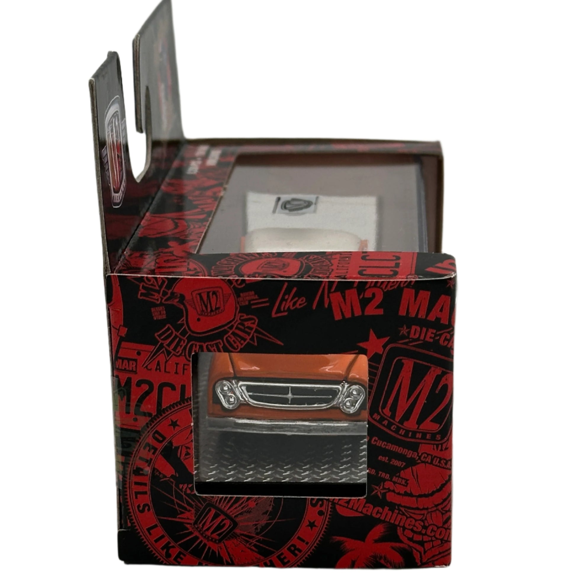 Red and black patterned box with a silver item inside on a white background